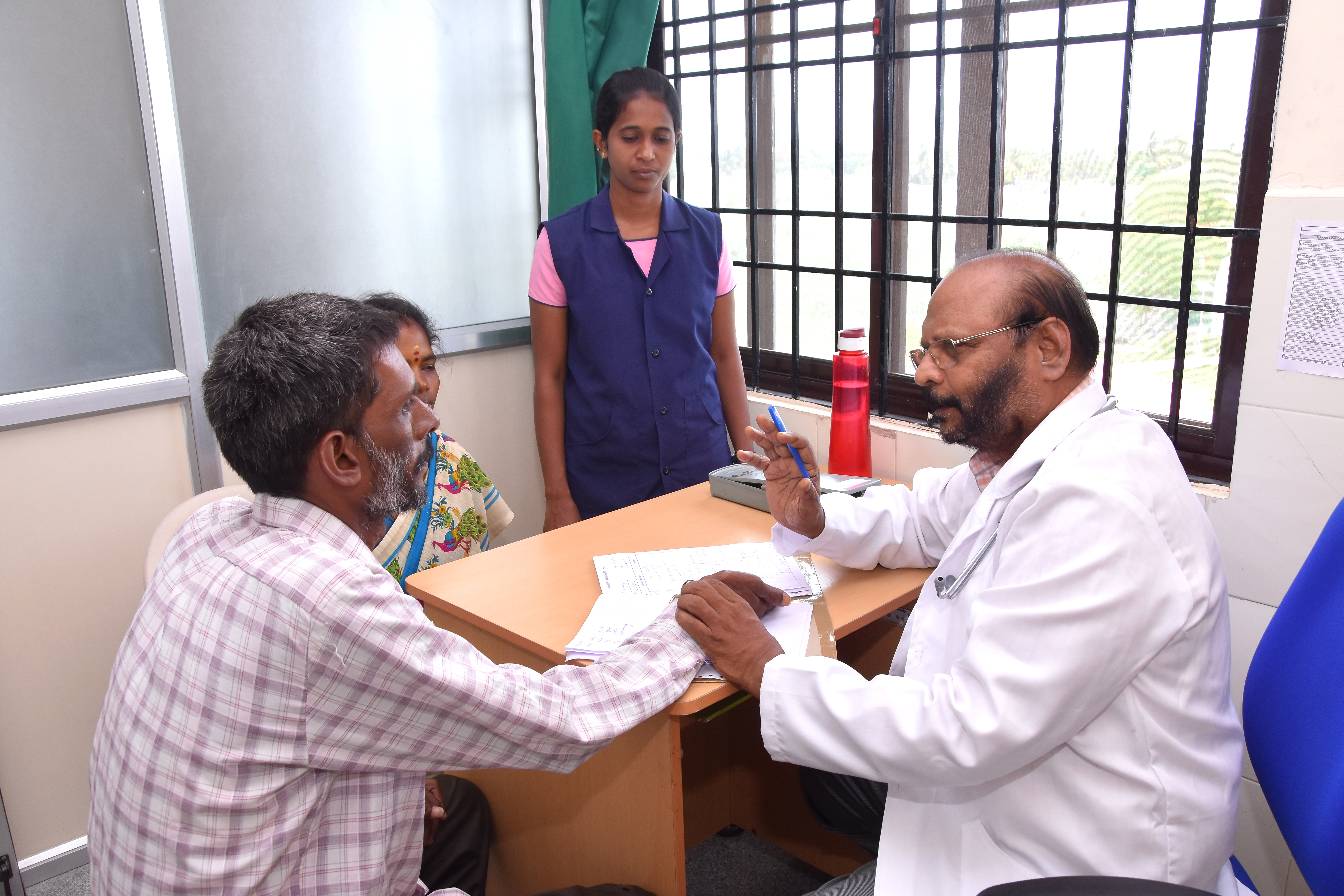 Dr. Kabilan examines